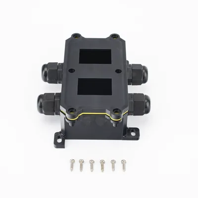 Caja de Montaje Superficial / 2 Espacios para Interruptores / IP65 / 4 Puertos PG9 / ABS/PA66 Retardante a la Flama / 104 x 119 x 40 mm