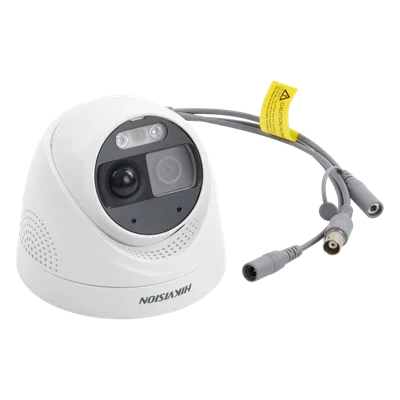 Cámara Turret TURBOHD / 2 Megapixel 1080p / Imagen a Color 24/7 / Luz Blanca 20 m (65.6 ft) / Sensor PIR 110° / Sirena 93.5 dB / Estrobo Rojo-Azul / IP67 / WDR 130 dB / Micrófono Integrado