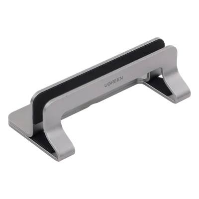 Soporte Vertical para Laptop / Ajustable 12-26 mm / Aluminio y Silicona / Hasta 15.6 pulgadas / Base Antideslizante / Color Plata