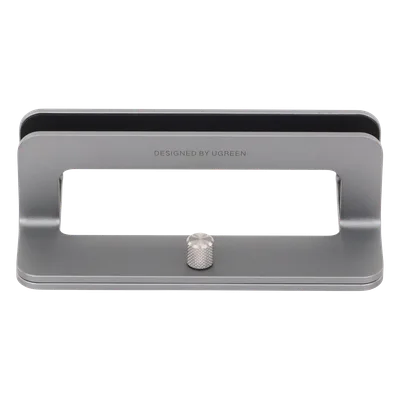 Soporte Vertical para Laptop / Ajustable 12-26 mm / Aluminio y Silicona / Hasta 15.6 pulgadas / Base Antideslizante / Color Plata